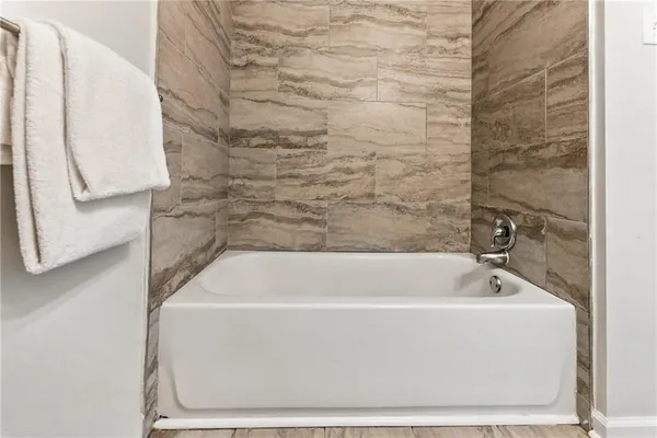 a bathroom with a bathtub