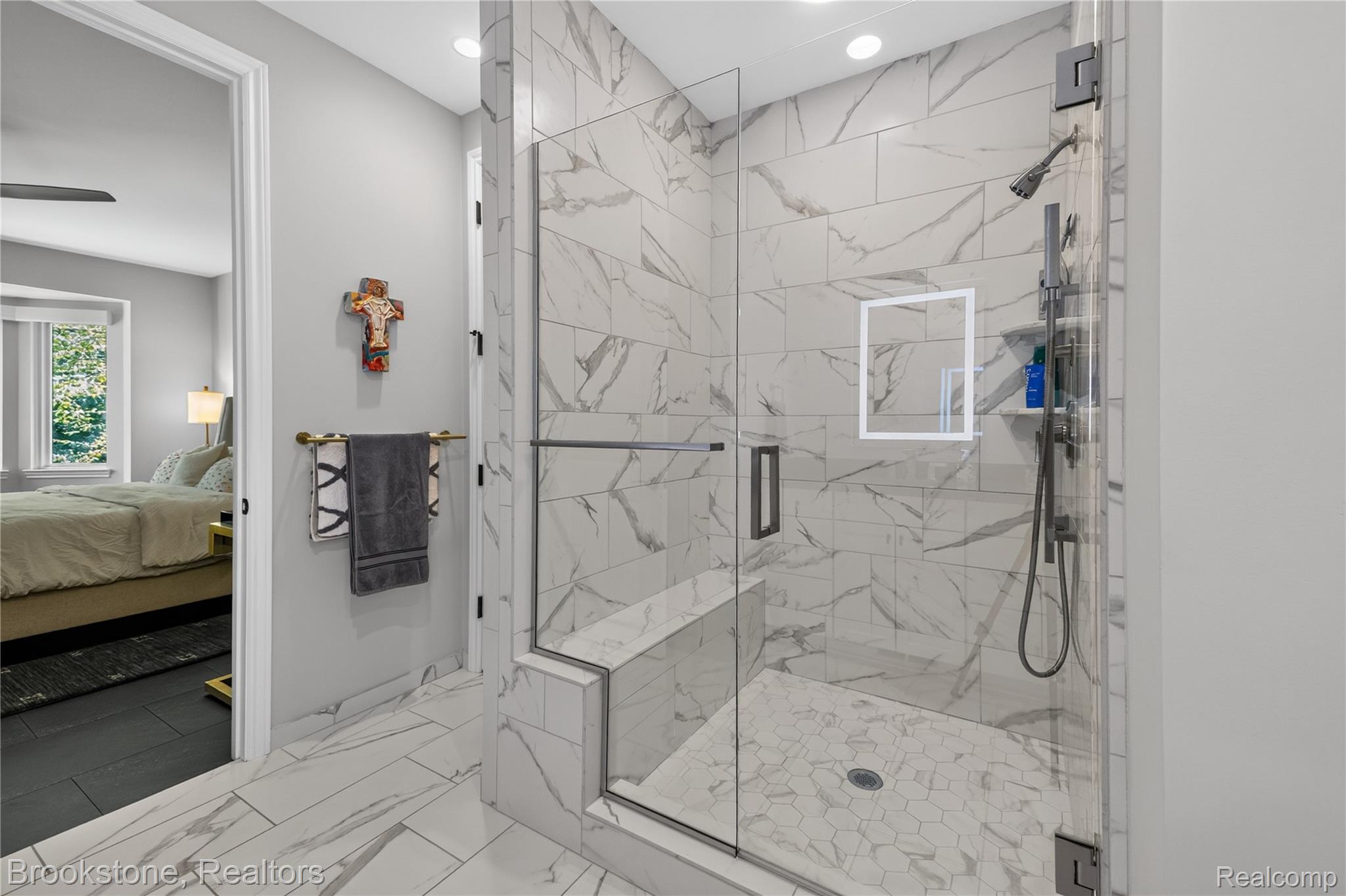 2167 Sanctuary Court Rochester, MI 48309 - Photo 17 of 68 Spacious walk-in shower with clear glass enclosure and hexagon tile flooring