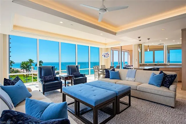a bathroom with a double vanity sink and mirror with shower