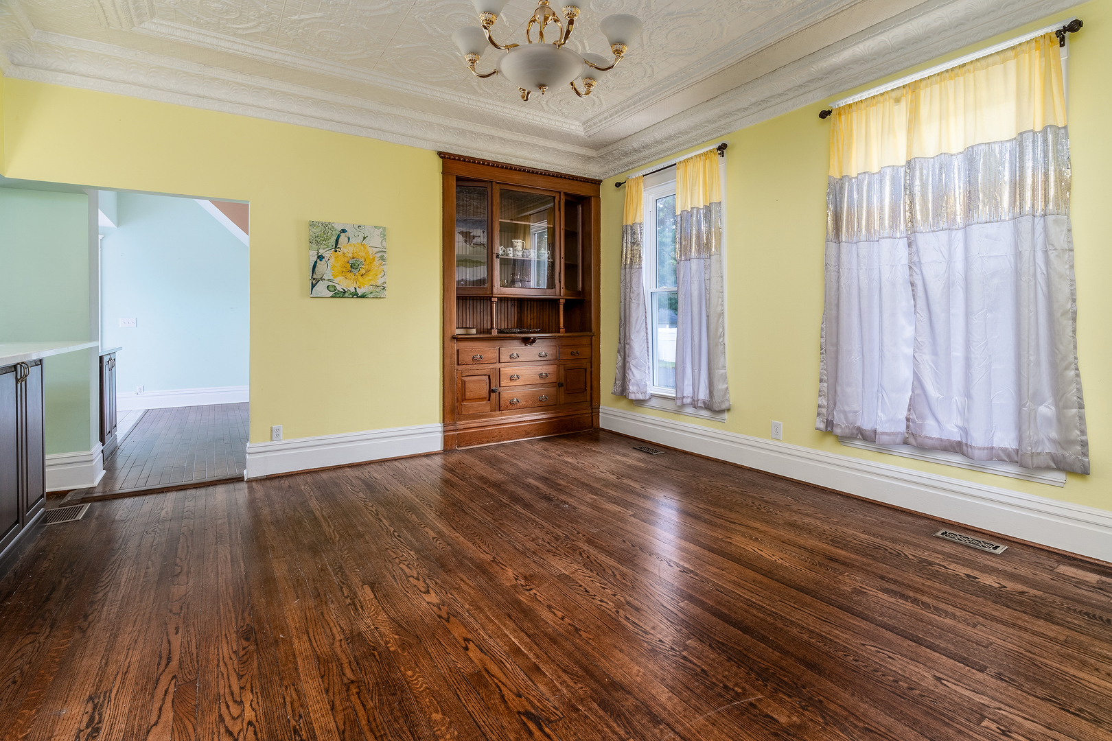 535 East Main Street Du Quoin, IL 62832 - Photo 11 of 75 a view of empty room with wooden floor and fan