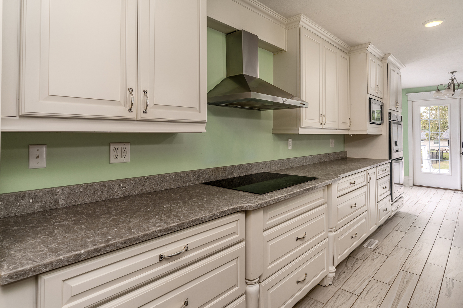 535 East Main Street Du Quoin, IL 62832 - Photo 15 of 75 a kitchen with stainless steel appliances granite countertop a sink a stove and cabinets