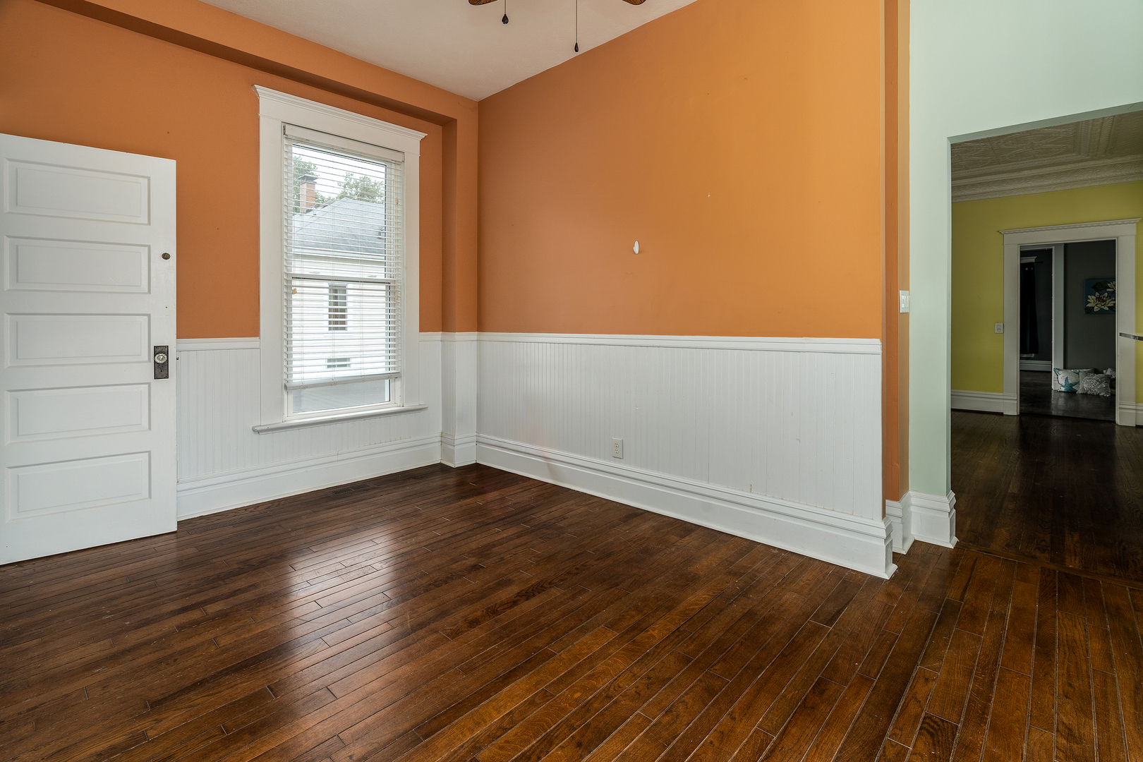 535 East Main Street Du Quoin, IL 62832 - Photo 19 of 75 an empty room with wooden floor and windows