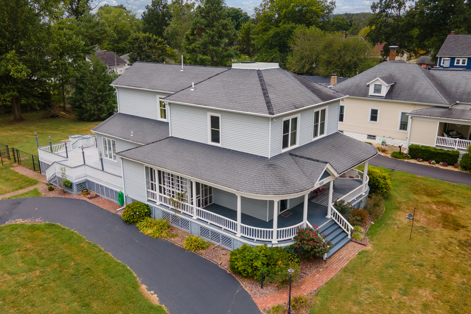 535 East Main Street Du Quoin, IL 62832 - Photo 2 of 75 an aerial view of a house with swimming pool and large trees