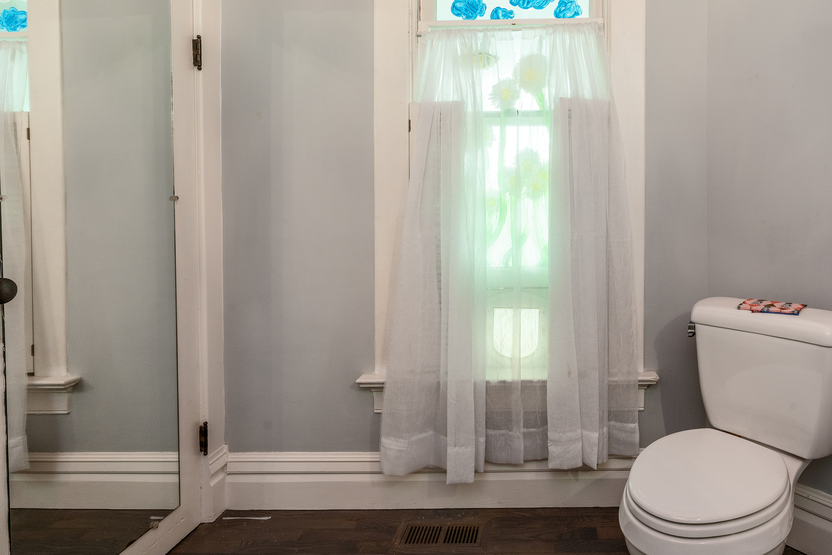 535 East Main Street Du Quoin, IL 62832 - Photo 22 of 75 a white toilet sitting next to a shower curtain