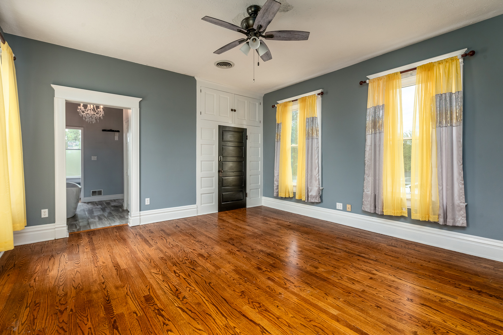 535 East Main Street Du Quoin, IL 62832 - Photo 28 of 75 a view of an empty room with a window and wooden floor