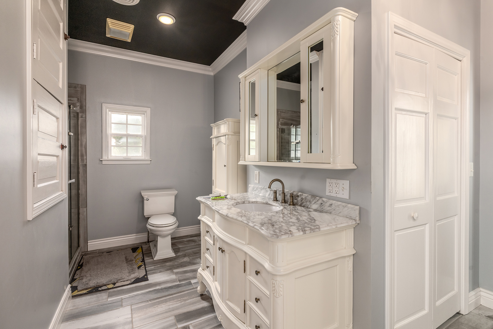 535 East Main Street Du Quoin, IL 62832 - Photo 30 of 75 a bathroom with a granite countertop sink and a toilet