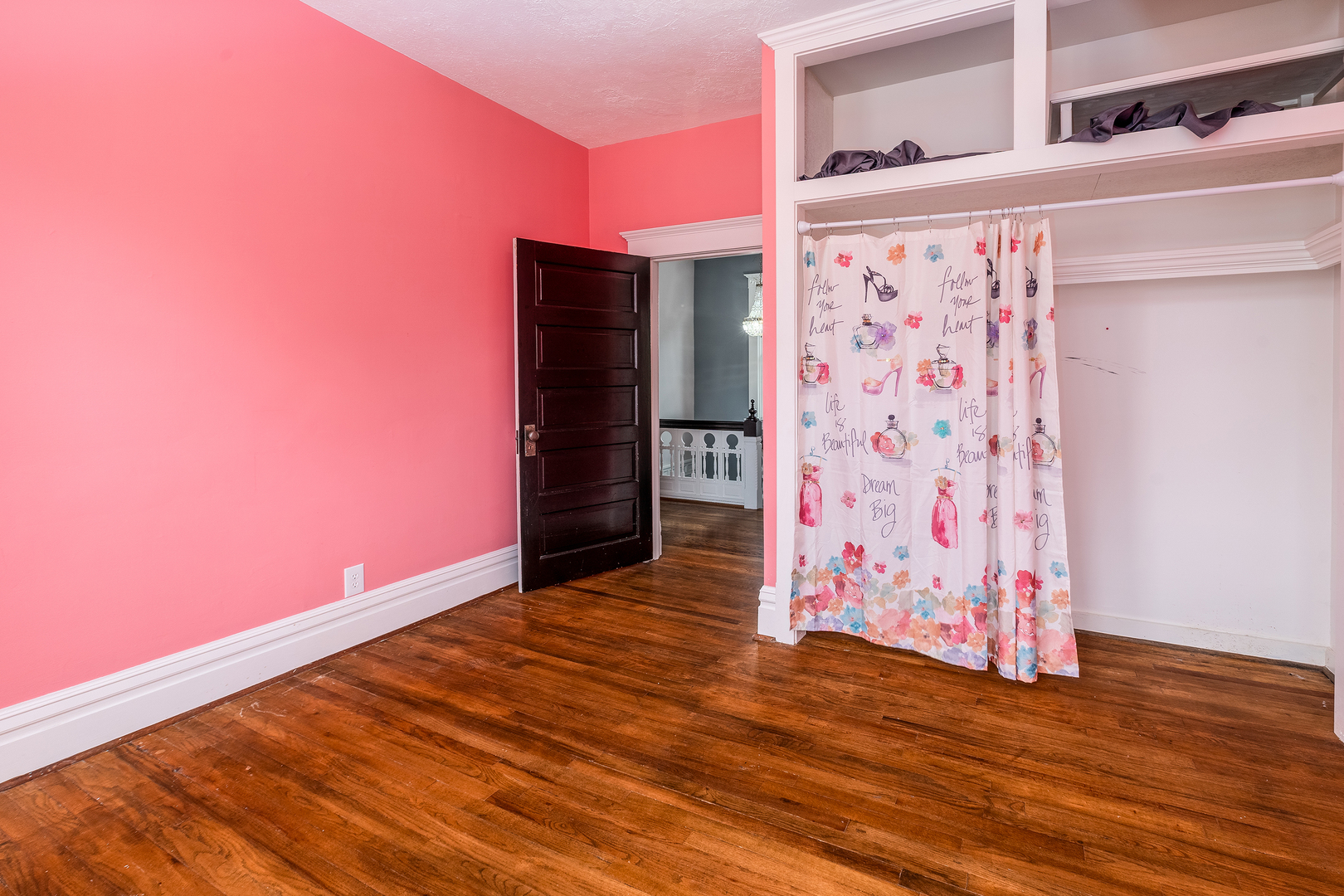535 East Main Street Du Quoin, IL 62832 - Photo 36 of 75 a view of an empty room with wooden floor and a window