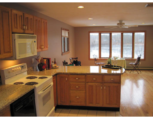 46 Shore Road Wellesley, MA 01760 - Photo 1 of 1 a kitchen with a sink a stove cabinets and wooden floor