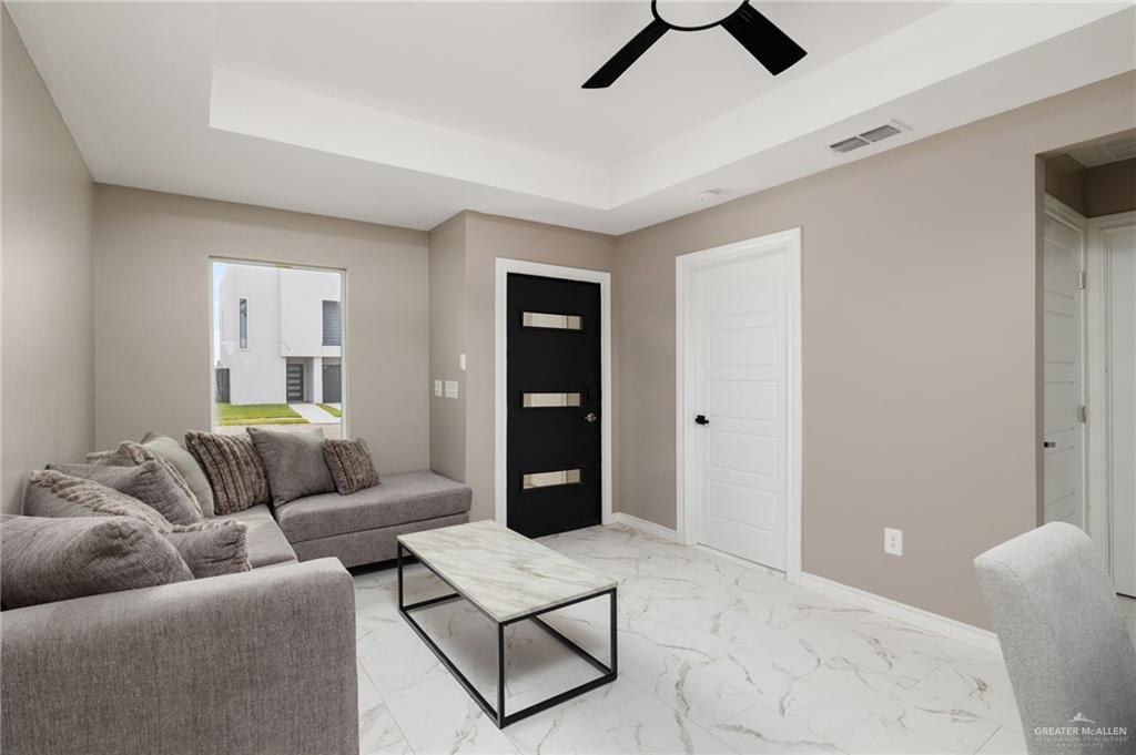 1712 West B Street Mission, TX 78572 - Photo 3 of 11 a living room with furniture