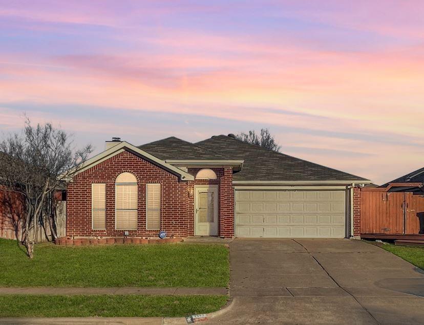 7007 Rovato Drive Arlington, TX 76001 - Photo 1 of 1 a front view of a house with a yard