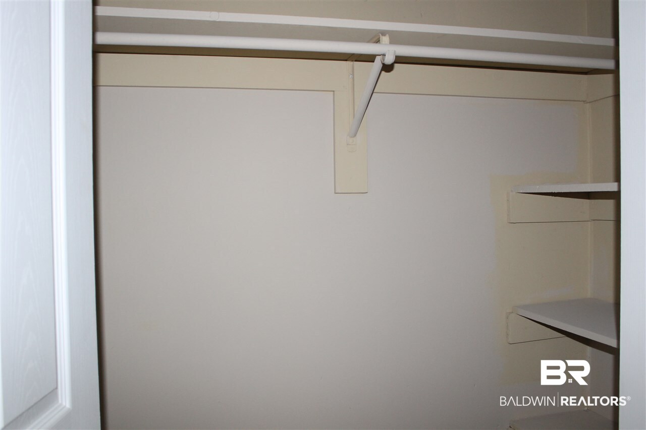 4587 Emerald Drive East Mobile, AL 36619 - Photo 10 of 16 Both guest bedrooms have nice sized closets.