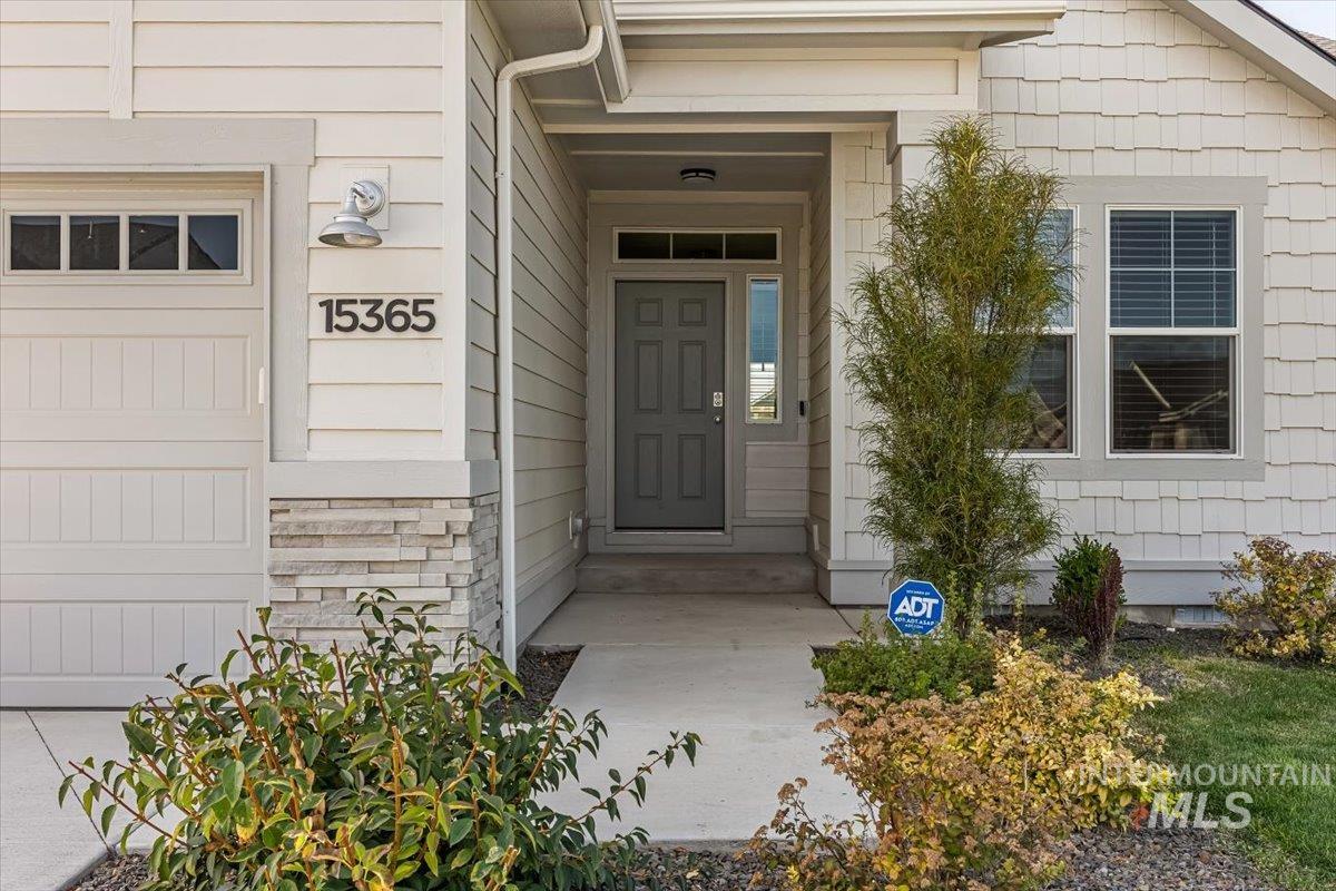 15365 Lutsen Avenue Caldwell, ID 83607 - Photo 2 of 42 Property entrance with stone siding