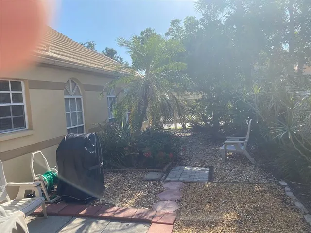 a view of a lake with a yard