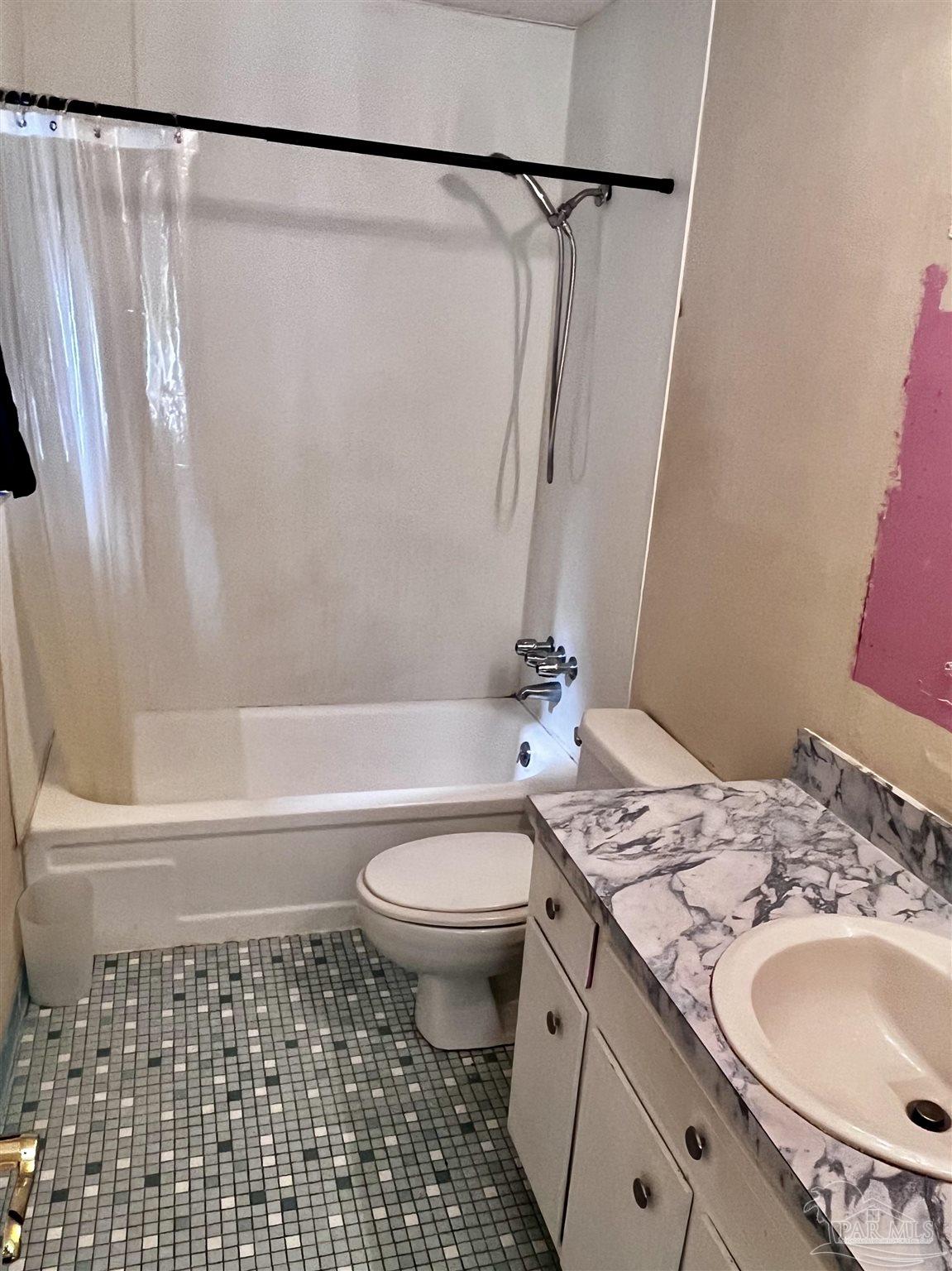 7270 Belgium Road Pensacola, FL 32526 - Photo 11 of 13 a bathroom with a granite countertop sink toilet and shower