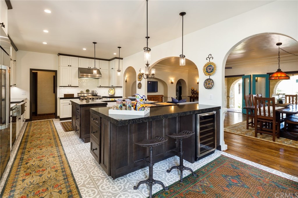 BRAND NEW Open Concept Gourmet Kitchen was completed in 2020, and features Custom Cabinetry, Quartz Countertops, Stainless Appliances, Bar Countertop Seating along w/ a Breakfast Nook