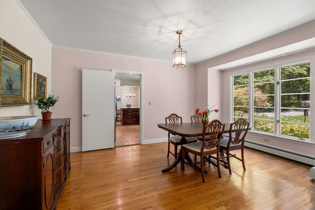 62 Mill Street Sherborn, MA 01770 - Photo 13 of 36 a view of a dining room with furniture window and wooden floor