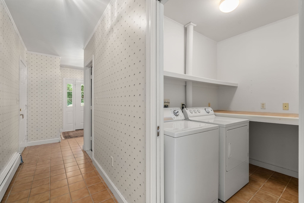 62 Mill Street Sherborn, MA 01770 - Photo 20 of 36 a bathroom with a sink and mirror