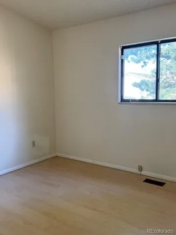 an empty room with a window