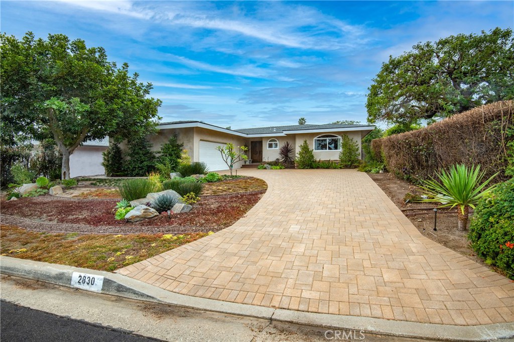 2830 San Ramon Drive Rancho Palos Verdes, CA 90275 - Photo 1 of 1 a front view of a house with garden