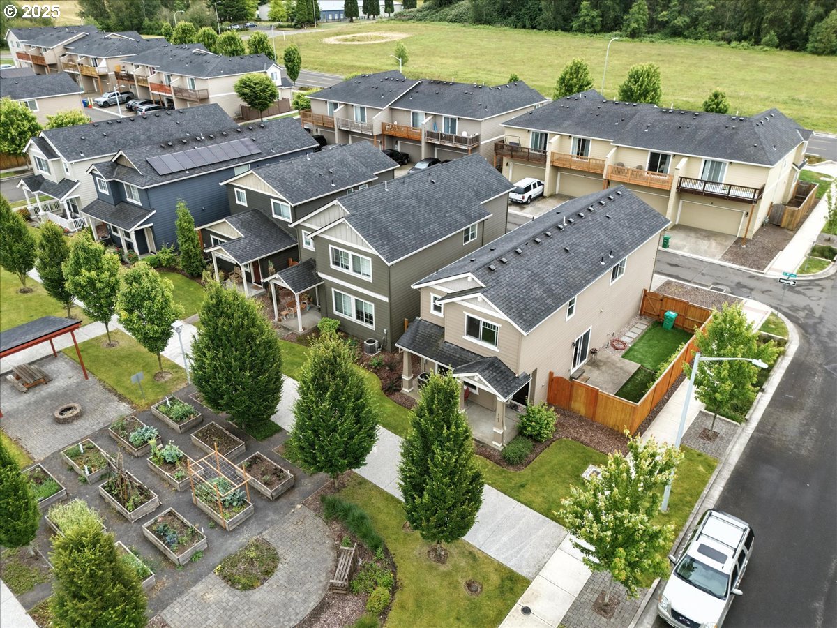 2103 Southeast 18th Alley Gresham, OR 97080 - Photo 22 of 25 an aerial view of a house with garden space and lake view