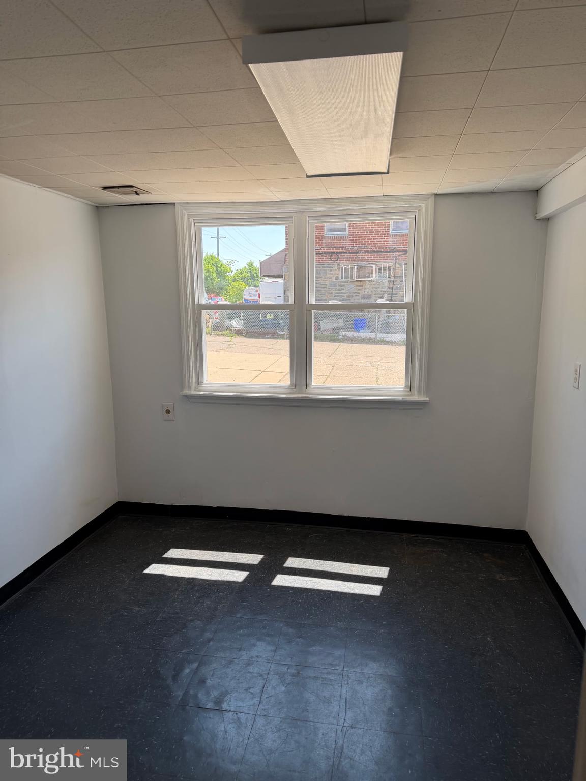 9083 Convent Avenue Philadelphia, PA 19136 - Photo 22 of 22 an empty room with a window