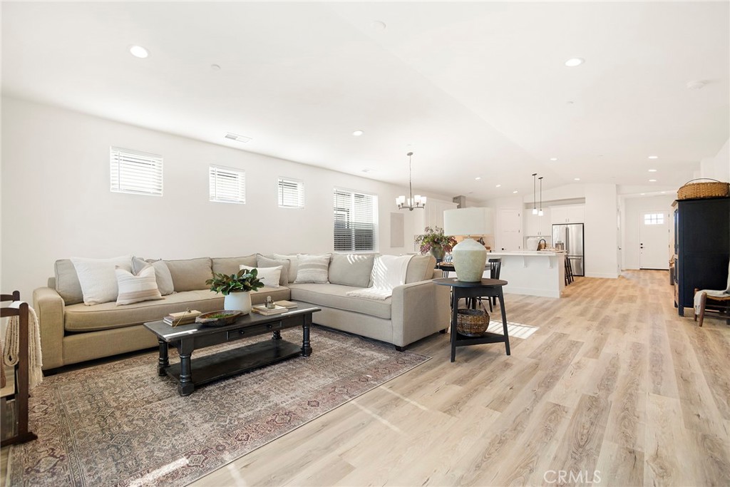 22 Harkness Court Chico, CA 95973 - Photo 11 of 49 a living room with furniture and a flat screen tv