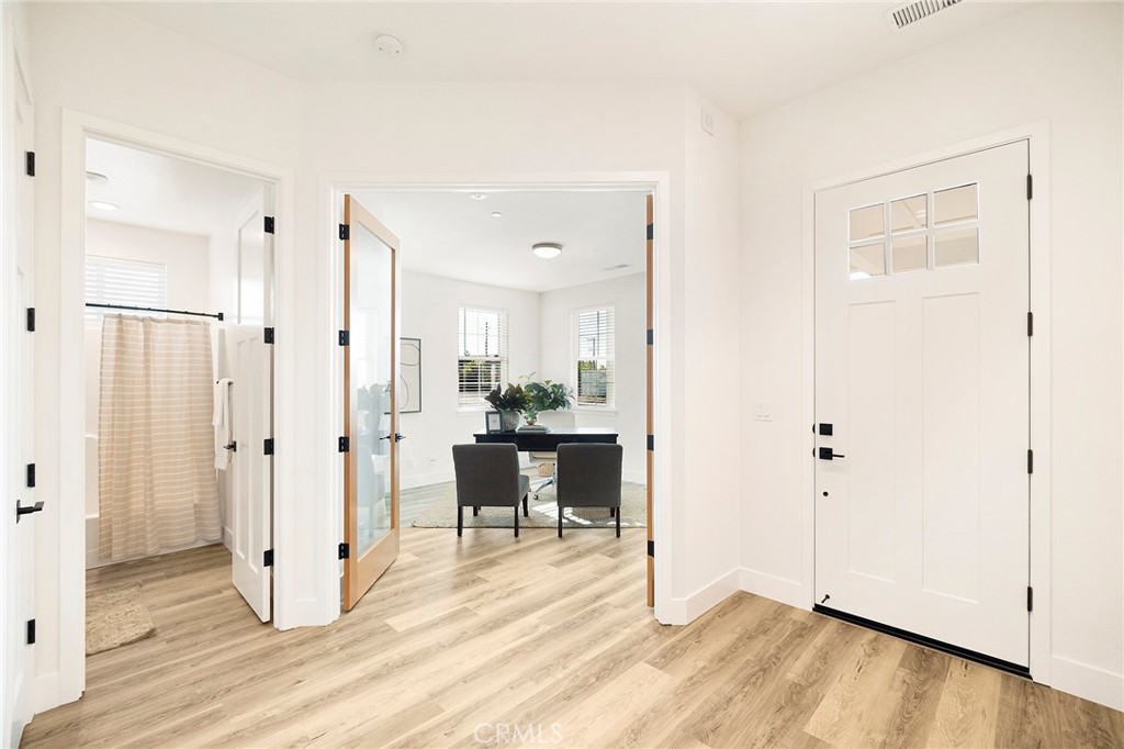 22 Harkness Court Chico, CA 95973 - Photo 31 of 49 a view of a room with wooden floor and white doors