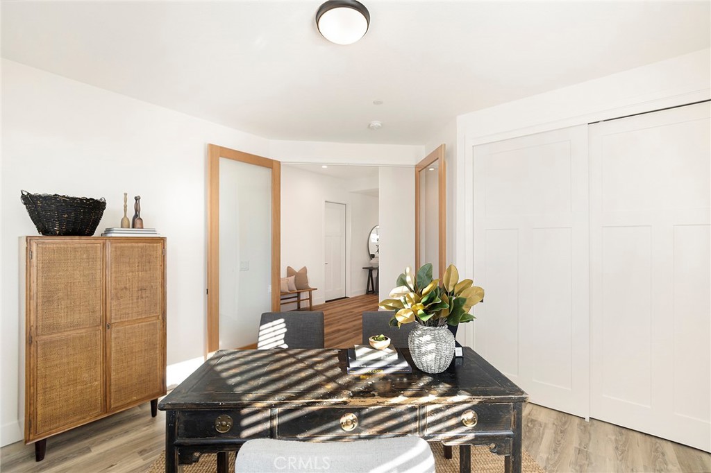 22 Harkness Court Chico, CA 95973 - Photo 32 of 49 a bedroom with a bed and a chandelier