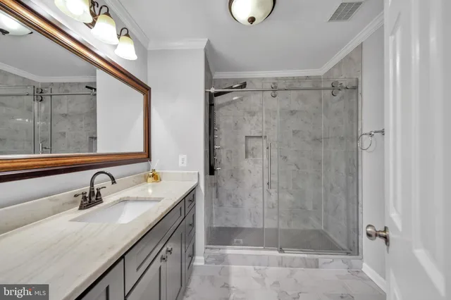 a view of a patio with table and chairs with wooden floor and fence