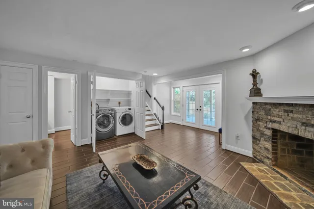 a room with furniture and a rug