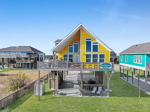 a front view of house with a yard