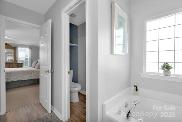 a bathroom with a tub and shower