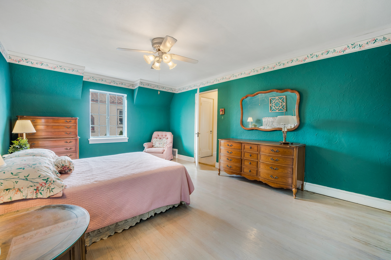 141 North Delaplaine Road Riverside, IL 60546 - Photo 15 of 19 a bedroom with a bed and a dresser