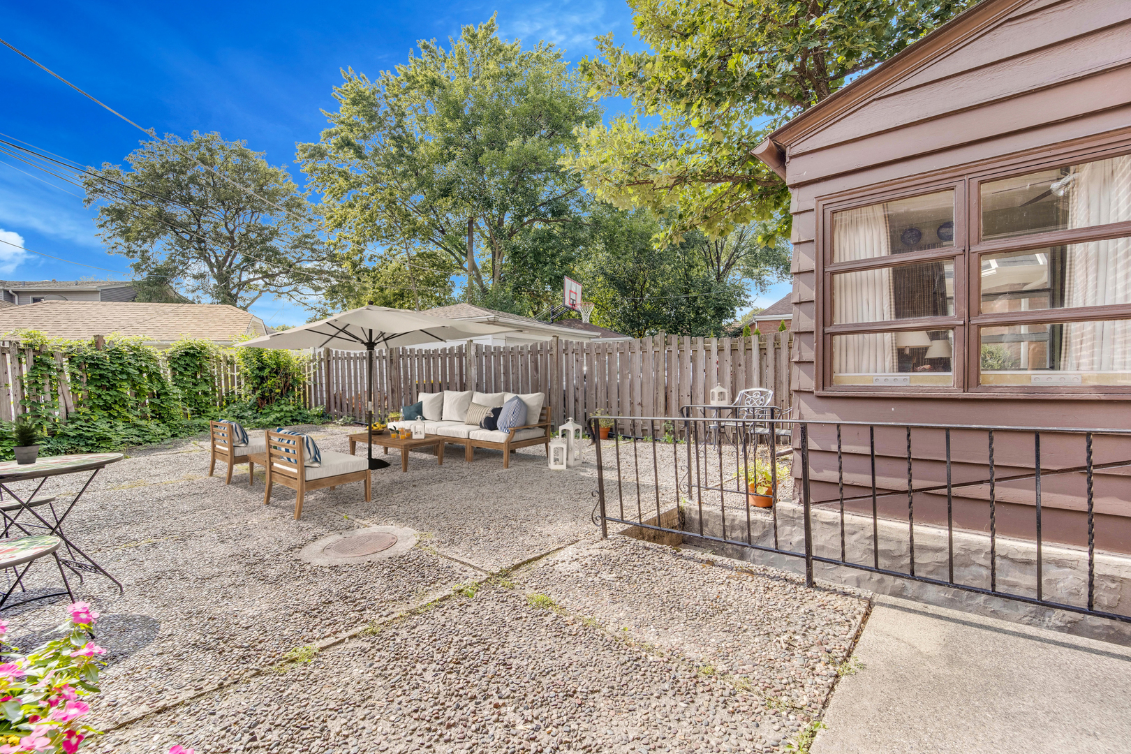 141 North Delaplaine Road Riverside, IL 60546 - Photo 17 of 19 a view of backyard with a patio and outdoor seating