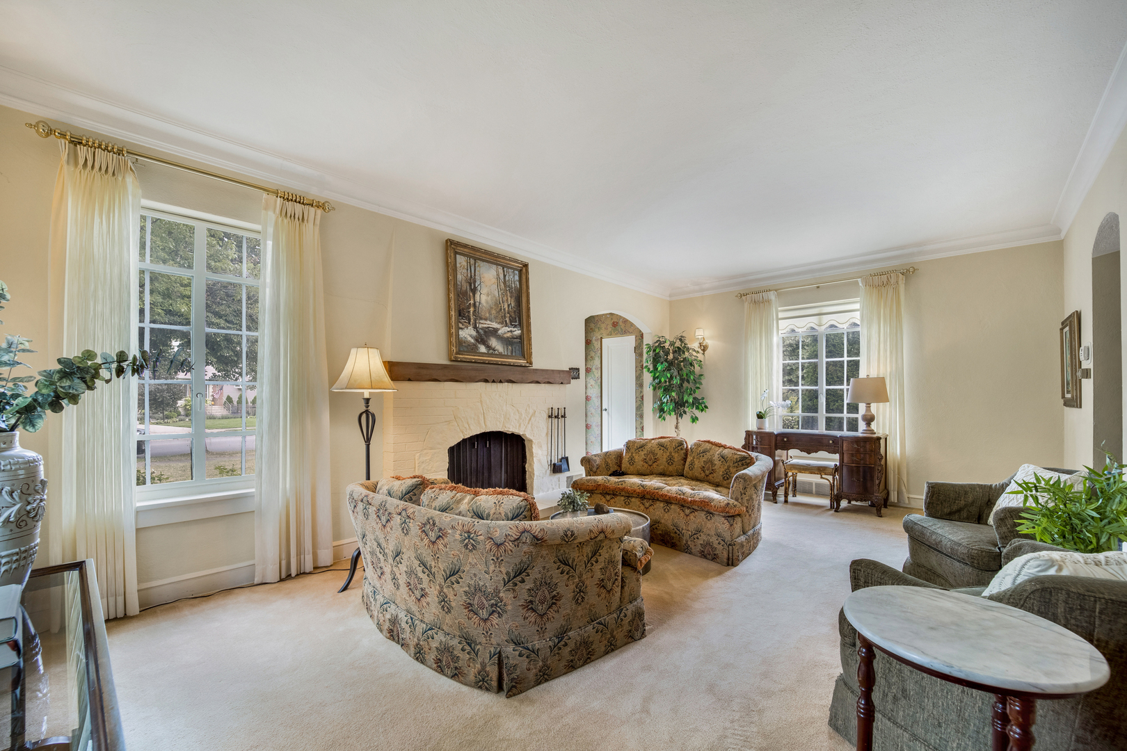 141 North Delaplaine Road Riverside, IL 60546 - Photo 4 of 19 a living room with furniture and a fireplace