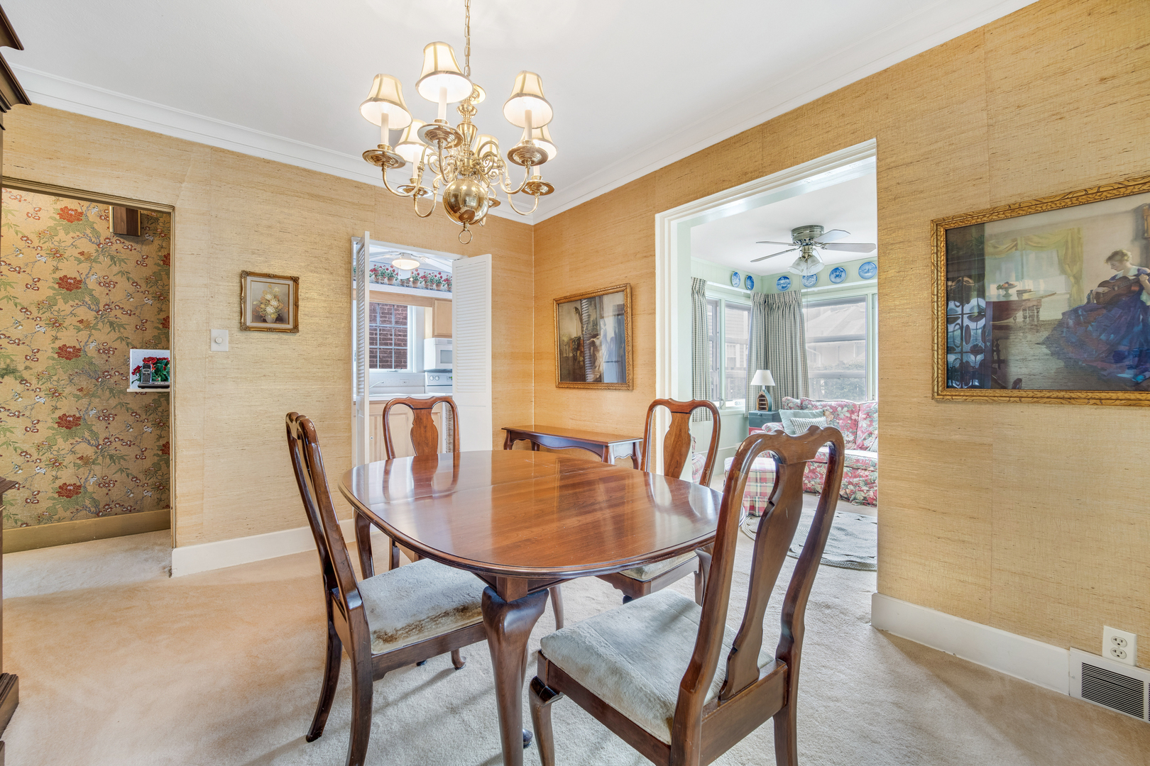 141 North Delaplaine Road Riverside, IL 60546 - Photo 8 of 19 a view of a dining room with furniture and chandelier