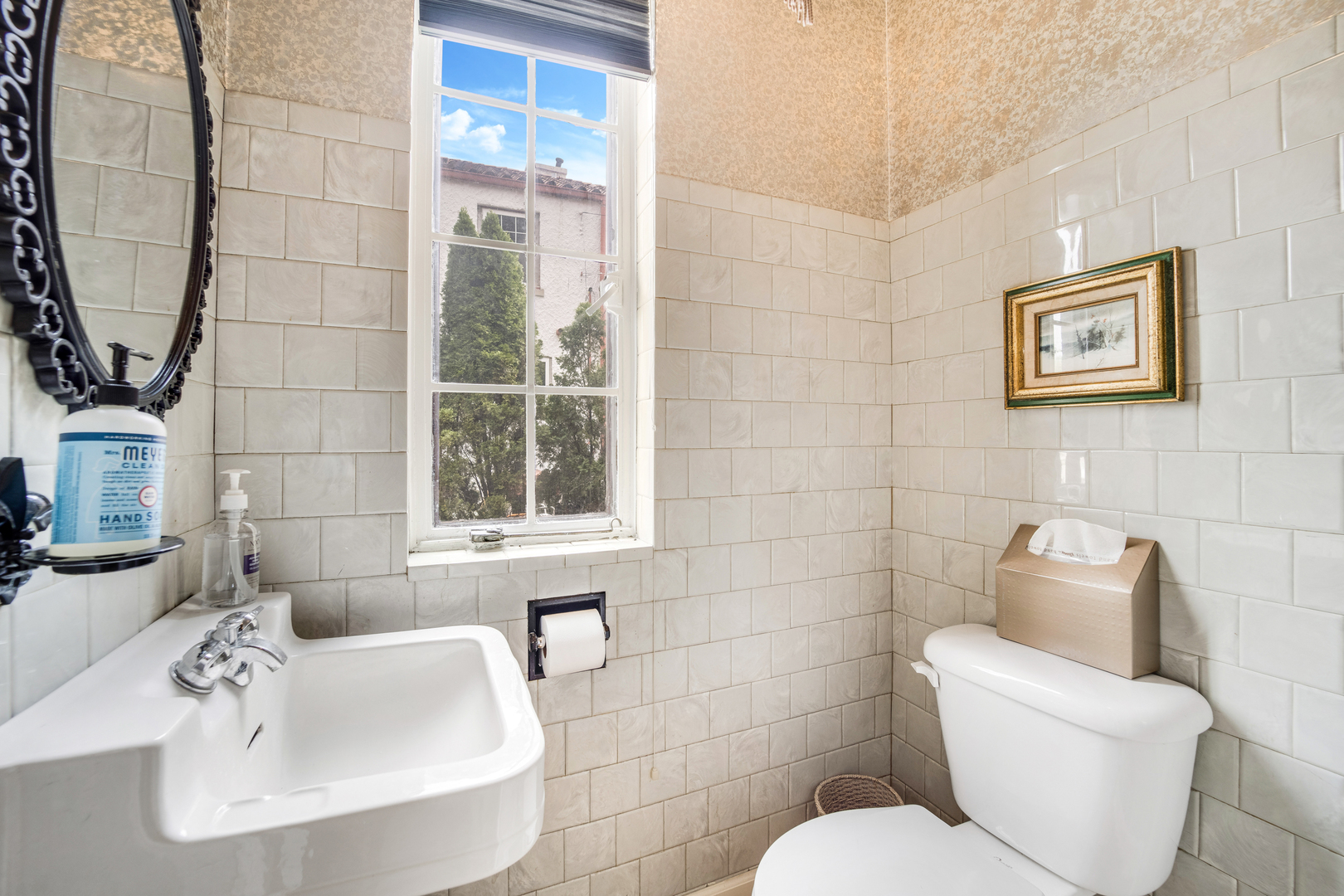 141 North Delaplaine Road Riverside, IL 60546 - Photo 9 of 19 a bathroom with a toilet sink and mirror