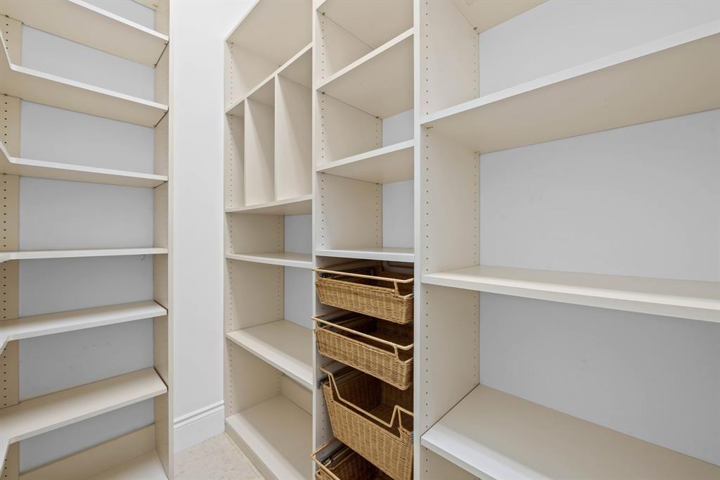 861 Nafa Drive Boca Raton, FL 33487 - Photo 22 of 54 a view of walk in closet with empty racks