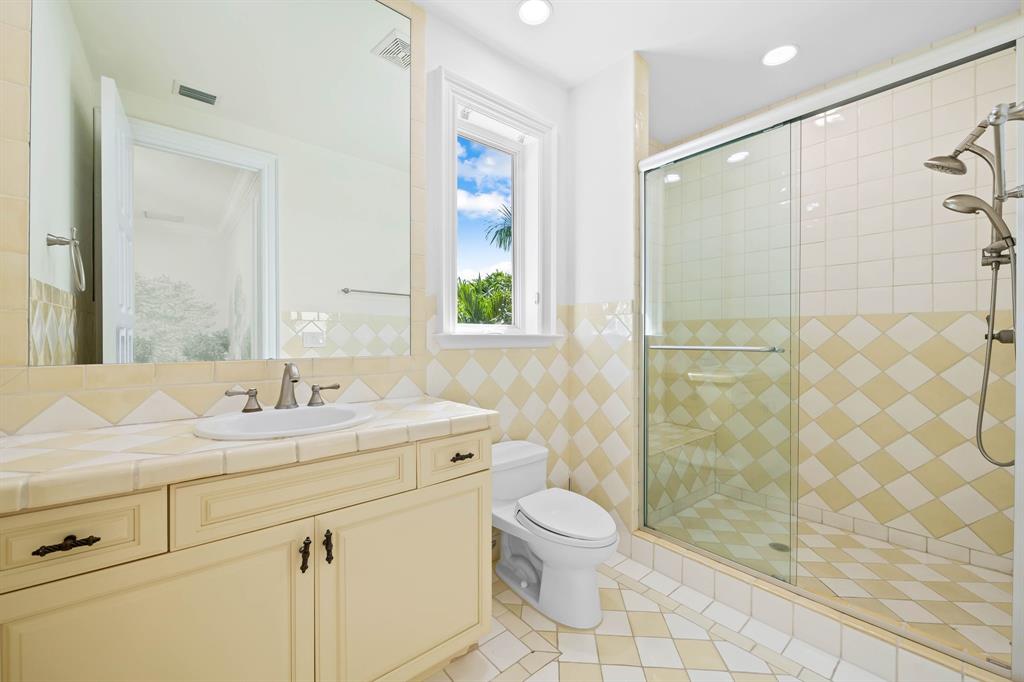 861 Nafa Drive Boca Raton, FL 33487 - Photo 36 of 54 a bathroom with a sink toilet and shower