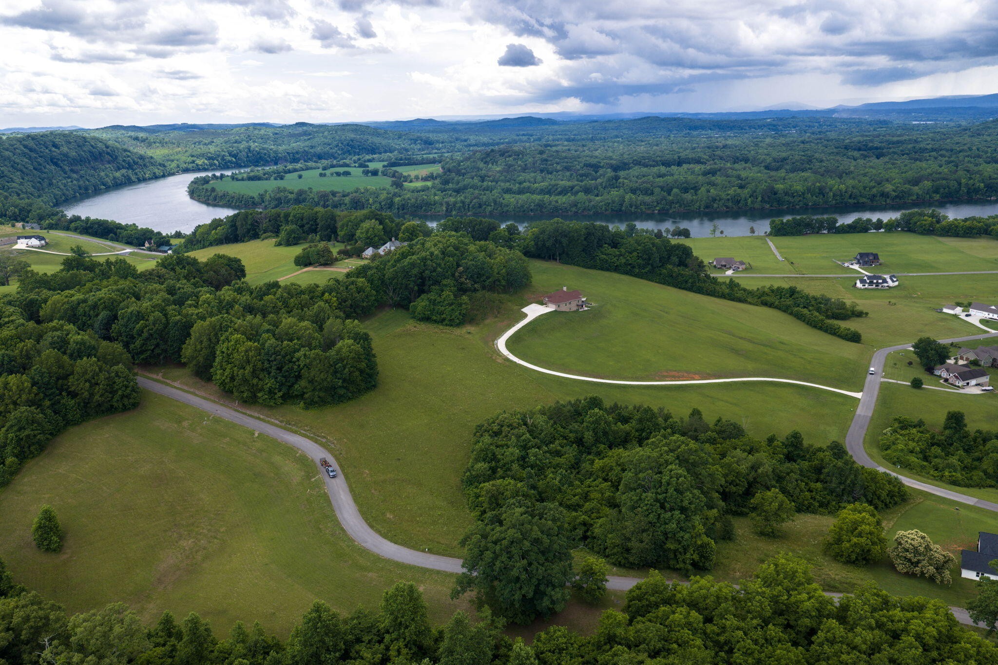 15 Espalier Drive Decatur, TN 37322 - Photo 4 of 9 an aerial view of a golf course with a swimming pool