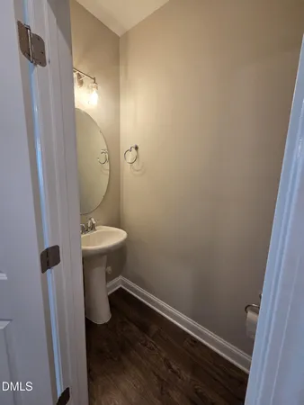 a bathroom with a sink and toilet
