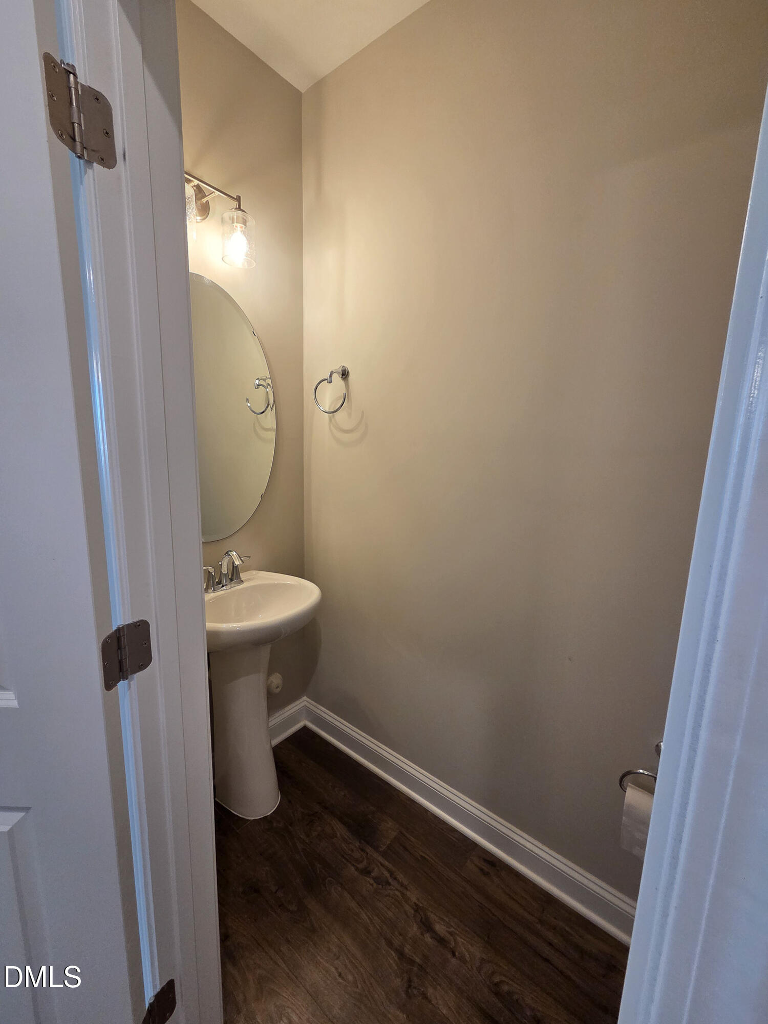 3008 Dunnock Drive Durham, NC 27713 - Photo 11 of 27 a bathroom with a sink and toilet