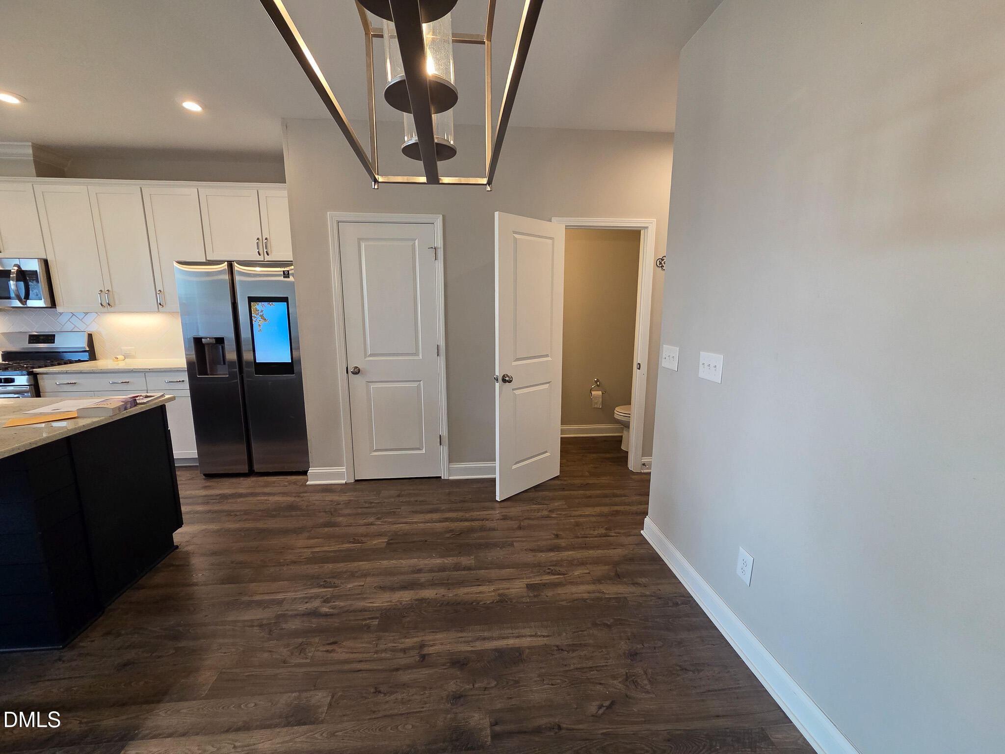 3008 Dunnock Drive Durham, NC 27713 - Photo 13 of 27 a view of a hallway with wooden floor