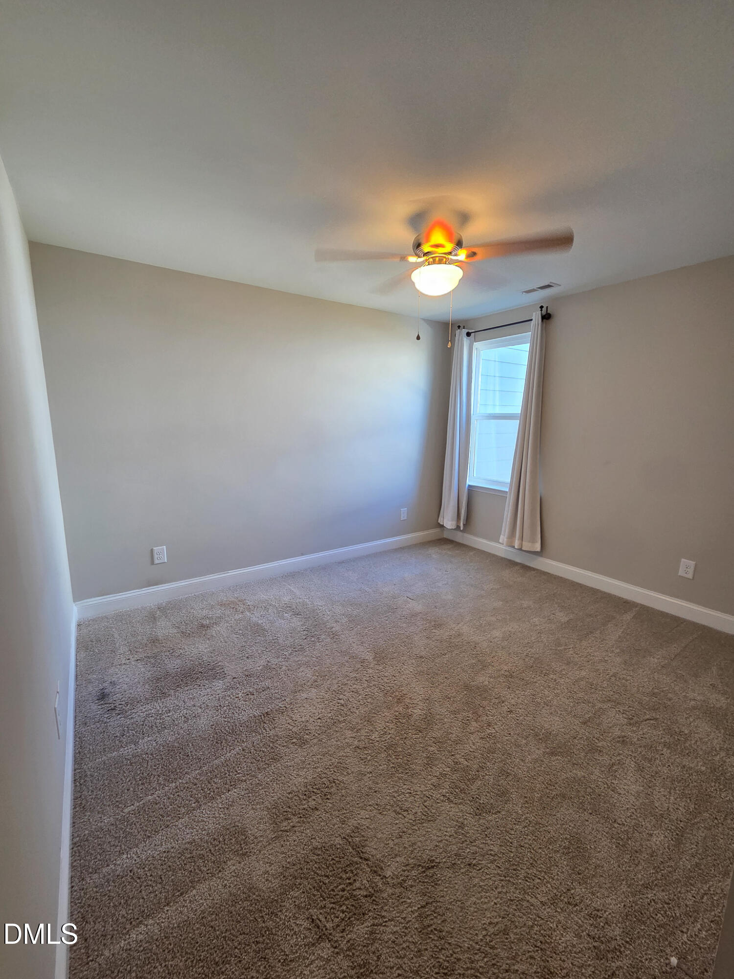 3008 Dunnock Drive Durham, NC 27713 - Photo 27 of 27 a view of an empty room with a window