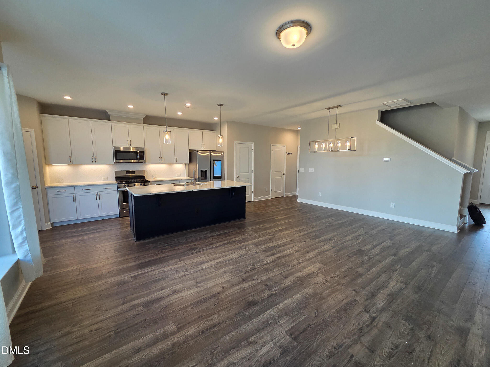 3008 Dunnock Drive Durham, NC 27713 - Photo 8 of 27 a view of kitchen and kitchen with granite countertop
