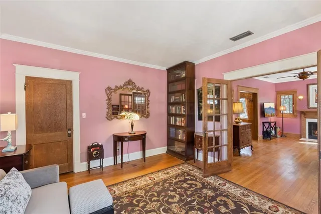 a living room with furniture and a rug