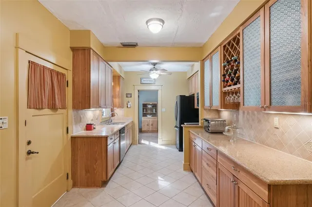 a large bathroom with a double vanity sink and a mirror