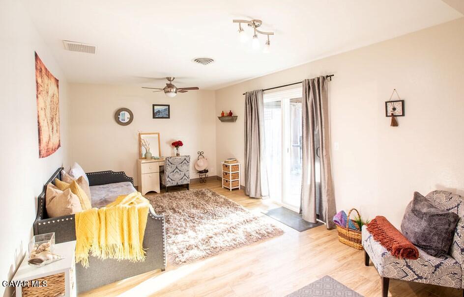 349 South Margalo Street Ridgecrest, CA 93555 - Photo 13 of 14 a living room with furniture and a window
