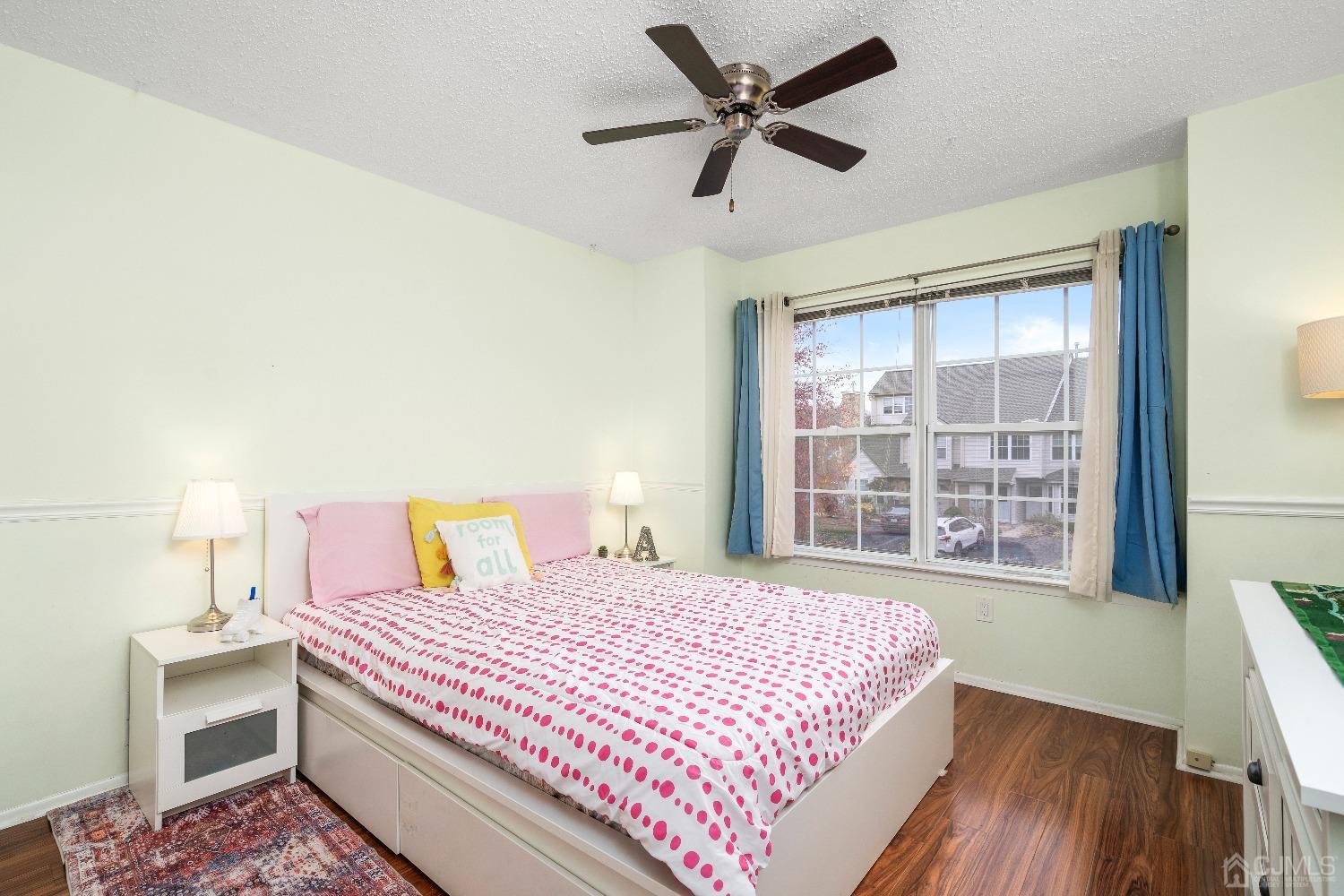 231 Nebula Road Piscataway, NJ 08854 - Photo 22 of 37 a bedroom with a large bed and a large window