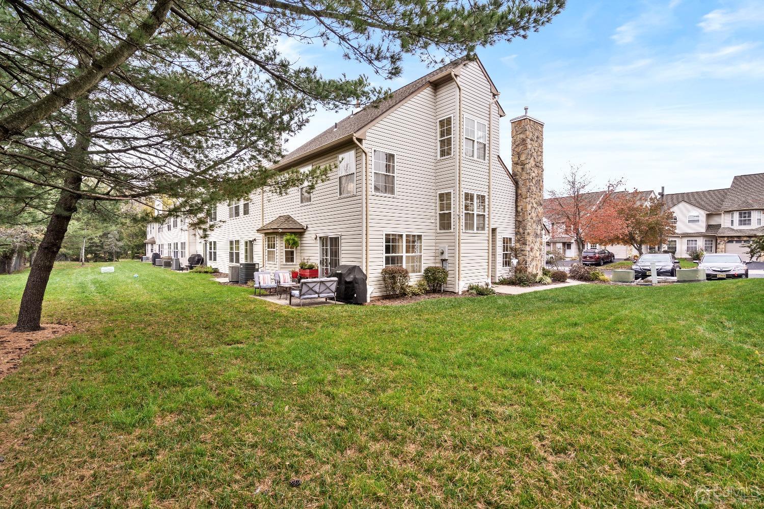 231 Nebula Road Piscataway, NJ 08854 - Photo 26 of 37 a view of house with backyard